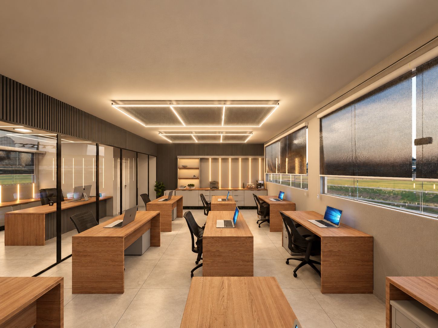 Sala de trabalho vista da entrada, com bancadas paralelas à janela